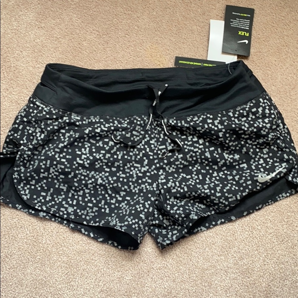 Nike shorts- black with reflective print